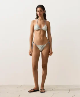 Slip bikini a copertura media con lacci in uncinetto a onde