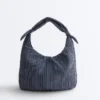Borsa a righe con nodo Borsa a righe con nodo