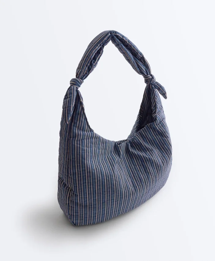 Borsa a righe con nodo Borsa a righe con nodo