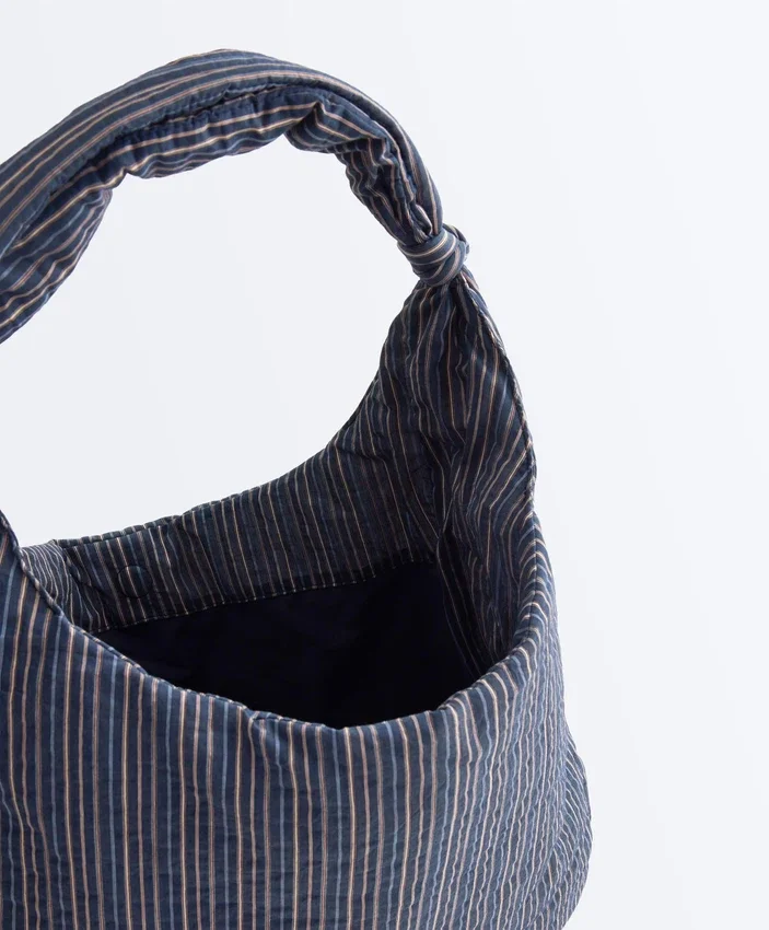 Borsa a righe con nodo Borsa a righe con nodo