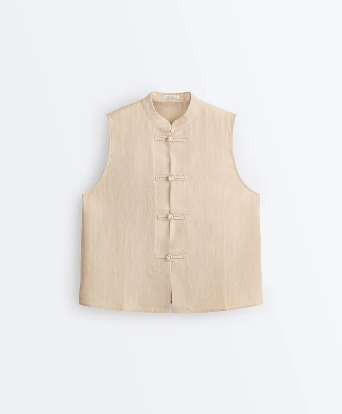 Camicie senza maniche in 100% lino con colletto alla coreana e bottoni Camicie senza maniche in 100% lino con colletto alla coreana e bottoni