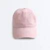 Cappellino effetto lavato in 100% cotone con laccio