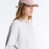 Cappellino effetto lavato in 100% cotone con laccio