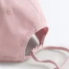Cappellino effetto lavato in 100% cotone con laccio