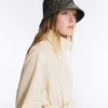 Cappellino impermeabile 10K con stampa leopardata Cappellino impermeabile 10K con stampa leopardata