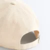 Cappellino in 100% cotone effetto lavato