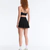 Compressive Mini Gonna a vita alta con volant