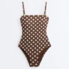 Costume intero a fascia in piqué a pois