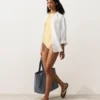 Costume intero all’americana in maglia all’uncinetto con effetto a bolle