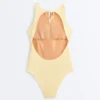 Costume intero all’americana in maglia all’uncinetto con effetto a bolle
