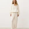 Felpa con mezza zip, tasca frontale, misto lyocell e 24% lino Felpa con mezza zip, tasca frontale, misto lyocell e 24% lino