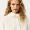 Felpa con mezza zip, tasca frontale, misto lyocell e 24% lino Felpa con mezza zip, tasca frontale, misto lyocell e 24% lino