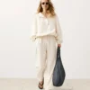 Felpa con mezza zip, tasca frontale, misto lyocell e 24% lino Felpa con mezza zip, tasca frontale, misto lyocell e 24% lino