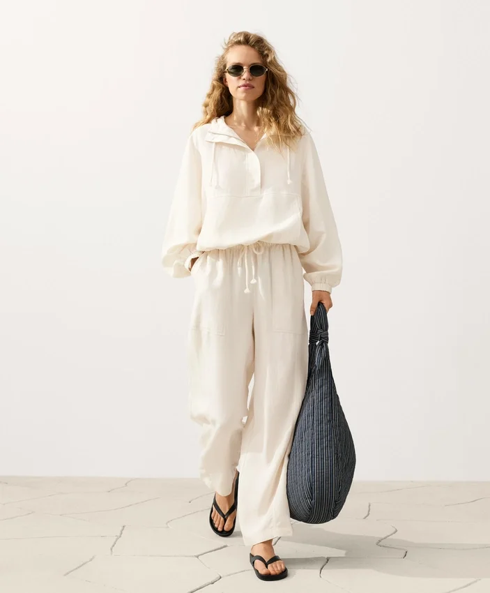 Felpa con mezza zip, tasca frontale, misto lyocell e 24% lino Felpa con mezza zip, tasca frontale, misto lyocell e 24% lino