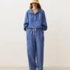 Felpa con mezza zip, tasca frontale, misto lyocell e 24% lino Felpa con mezza zip, tasca frontale, misto lyocell e 24% lino