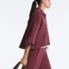 Felpa polo in misto cotone con maniche larghe