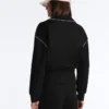 Giacca con bordino effetto neoprene