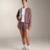 Giacca con cappuccio in maglia a coste