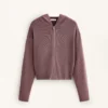 Giacca con cappuccio in maglia a coste