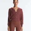 Giacca con cappuccio in maglia a costine