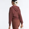 Giacca con cappuccio in maglia a costine