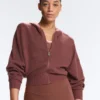 Giacca con cappuccio in maglia a costine