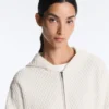 Giacca con cappuccio in maglia strutturata