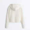 Giacca con cappuccio in maglia strutturata
