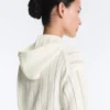Giacca con cappuccio in maglia traforata
