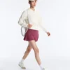 Giacca con cappuccio in maglia traforata