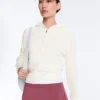 Giacca con cappuccio in maglia traforata