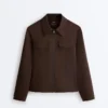 Giacca con peplo effetto neoprene e bordi a costine