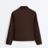 Giacca con peplo effetto neoprene e bordi a costine