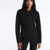 Giacca con peplo effetto neoprene e bordi a costine