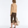 Giacca con peplo effetto neoprene e bordi a costine