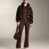 Giacca con peplo effetto neoprene e bordi a costine