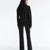 Giacca con peplo effetto neoprene e bordi a costine