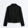 Giacca con peplo effetto neoprene e bordi a costine