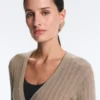 Giacca in maglia a coste con chiusura con lacci laterali Giacca in maglia a coste con chiusura con lacci laterali