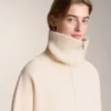 Giacca in maglia con collo alto Giacca in maglia con collo alto