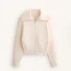 Giacca in maglia con collo alto Giacca in maglia con collo alto