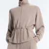 Giacca in modal Soft Touch con vita regolabile e collo alto Giacca in modal Soft Touch con vita regolabile e collo alto