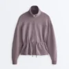 Giacca in modal Soft Touch con vita regolabile e collo alto Giacca in modal Soft Touch con vita regolabile e collo alto