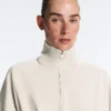 Giacca in piqué di cotone con cintura Giacca in piqué di cotone con cintura