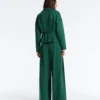 Pantaloni a gamba larga in piqué di cotone con pieghe Pantaloni a gamba larga in piqué di cotone con pieghe