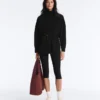 Giacca lunga con tasche in modal e Soft Touch Giacca lunga con tasche in modal e Soft Touch
