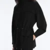 Giacca lunga con tasche in modal e Soft Touch Giacca lunga con tasche in modal e Soft Touch