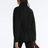 Giacca lunga con tasche in modal e Soft Touch Giacca lunga con tasche in modal e Soft Touch