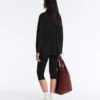 Giacca lunga con tasche in modal e Soft Touch Giacca lunga con tasche in modal e Soft Touch