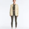 Giacca lunga in maglia con cappuccio Giacca lunga in maglia con cappuccio